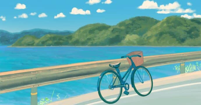 Bicyclette posée contre une barrière en bois le long d'un lac en été
